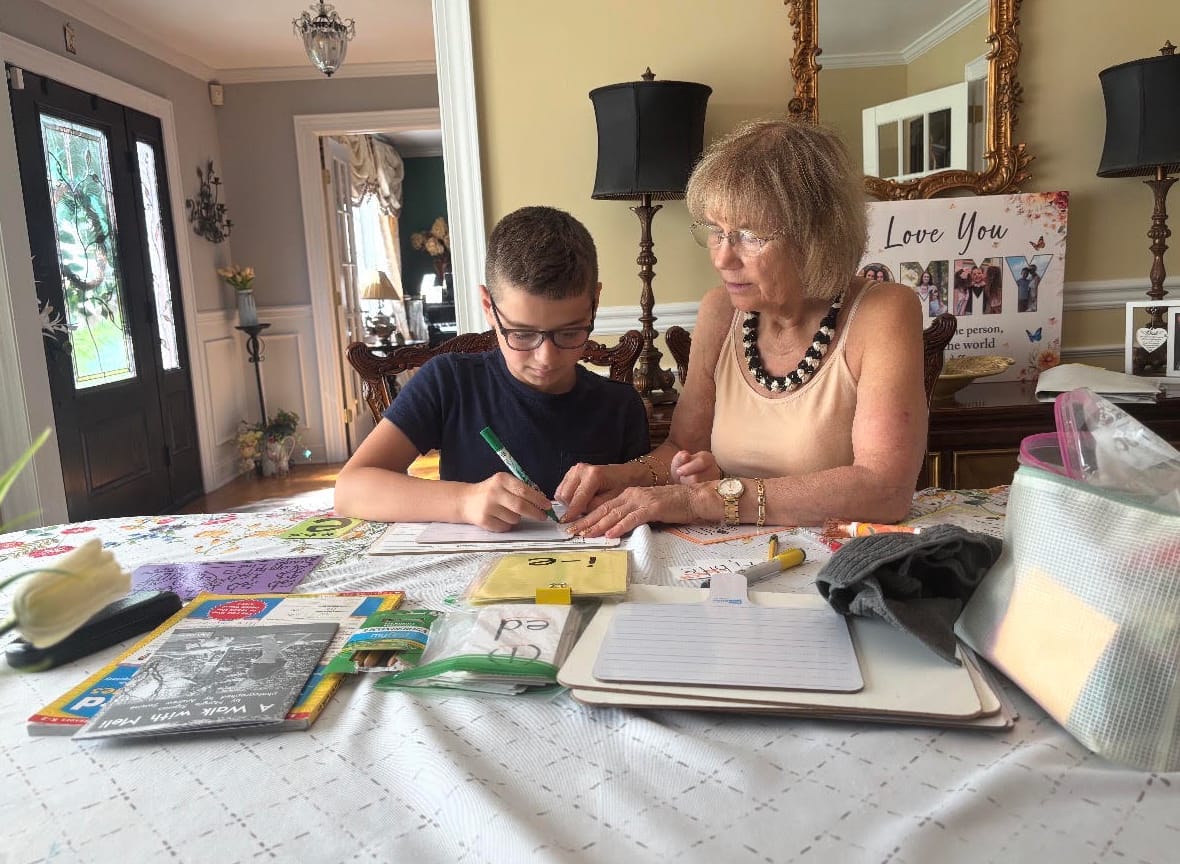 In-home Orton-Gillingham reading session at a family dining table